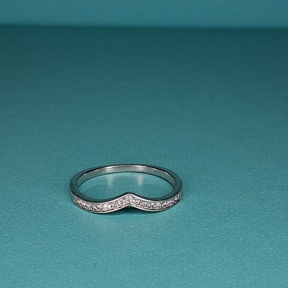Platinum Ring .30 CT real moissanite diamonds
stamped PT 950
size 7